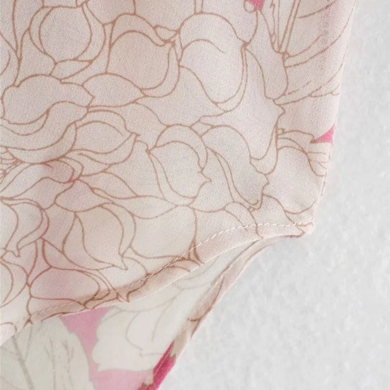 OVERSIZED FLORAL PRINT ASYMMETRY BLOUSE